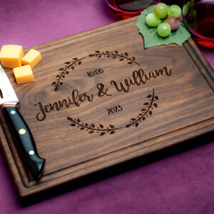 Custom wooden charcuterie board with cheese green grapes and red wine