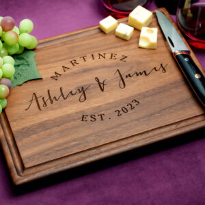 walnut cutting board custom engraving with grapes cheese glass of red wine
