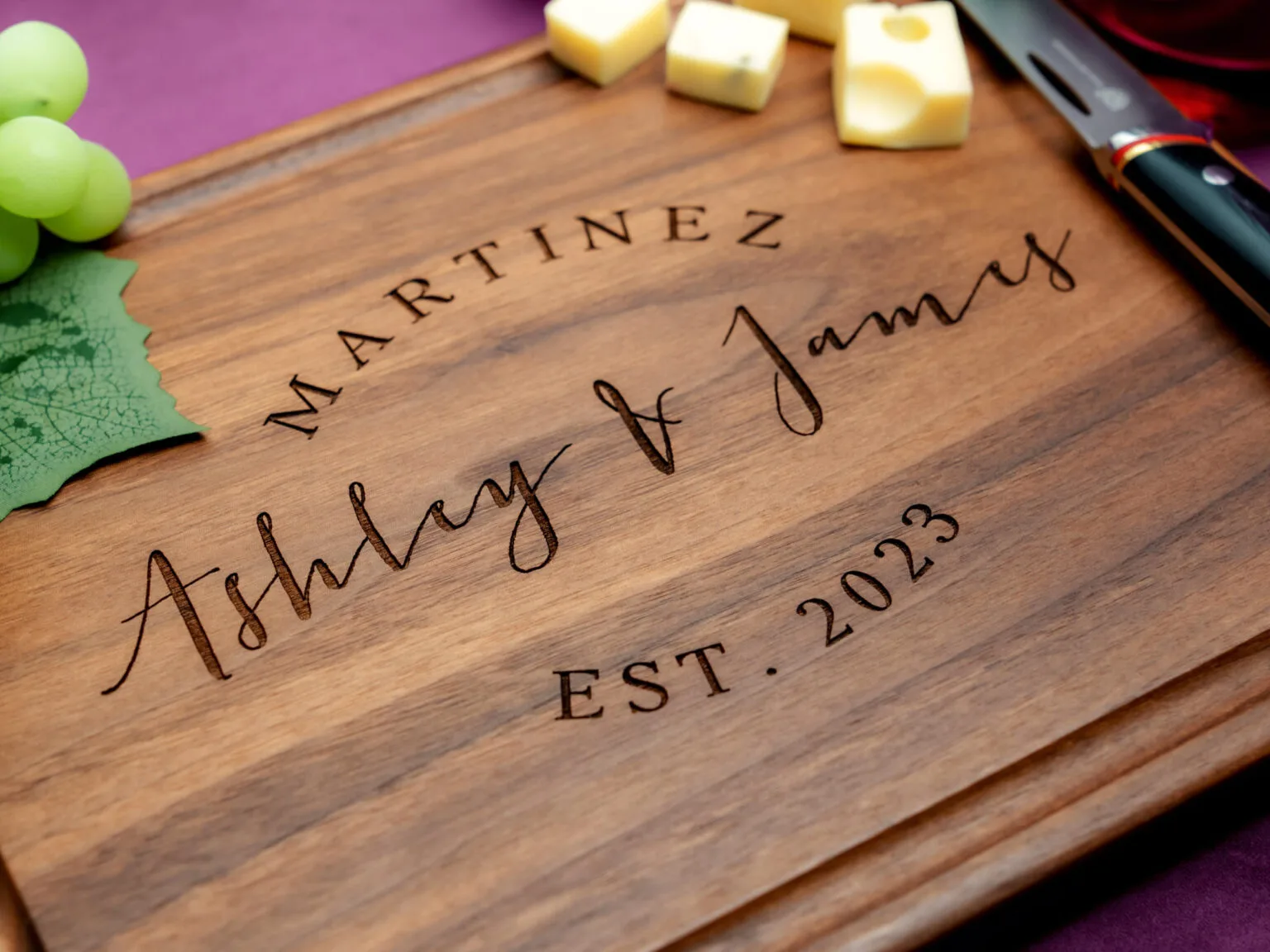 engraved cutting board with last name first names and date unique gift