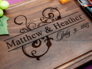 handmade cutting board engraved for couple engagement gift with first names and date