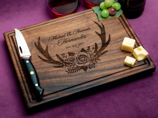 custom handmade cutting board engraved with floral antlers design