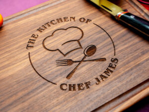 Walnut charcuterie board with chef’s kitchen design engraved