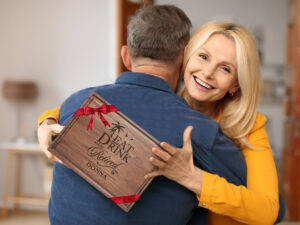 Senior woman holding surprise retirement gift