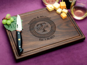 personalized cutting board engraved with couples initial and names