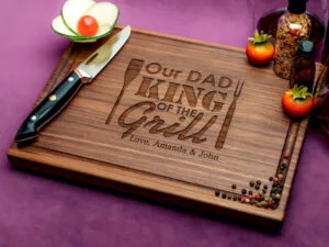 wooden cutting board featuring a sharp knife alongside a bottle of red wine creating a culinary ambiance