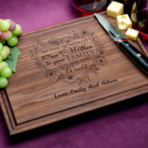 A walnut cutting board with juice groove, featuring 'Mother I will be there for you' engraved in elegant script. Customize this heartfelt gift for a personal touch, ideal for celebrating mothers and special moments.