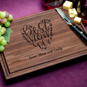A walnut cutting board with a juice groove, engraved with 'Best Mom Ever' design. This personalized and practical gift celebrates motherhood with elegance and functionality, making it the perfect gift for any occasion.