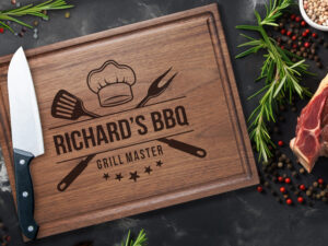 Walnut cutting board with personalized design for grill master