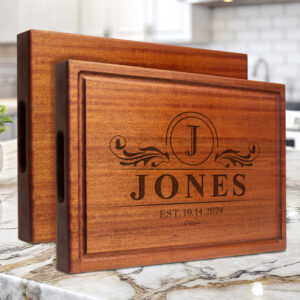 handmade mahogany chopping block with handles custom engraved with initial last name and date for unique wedding anniversary or birthday