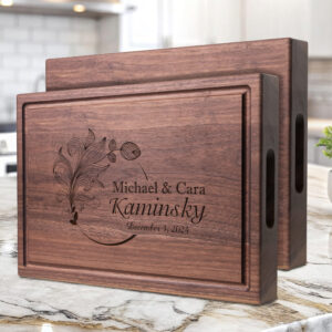 handmade walnut hardwood chopping block custom engraved with feather design with first names last name and date gift for wedding or anniversary