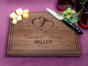 Walnut hardwood cutting board personalized with couples names and last name perfect wedding gift or vows renewal
