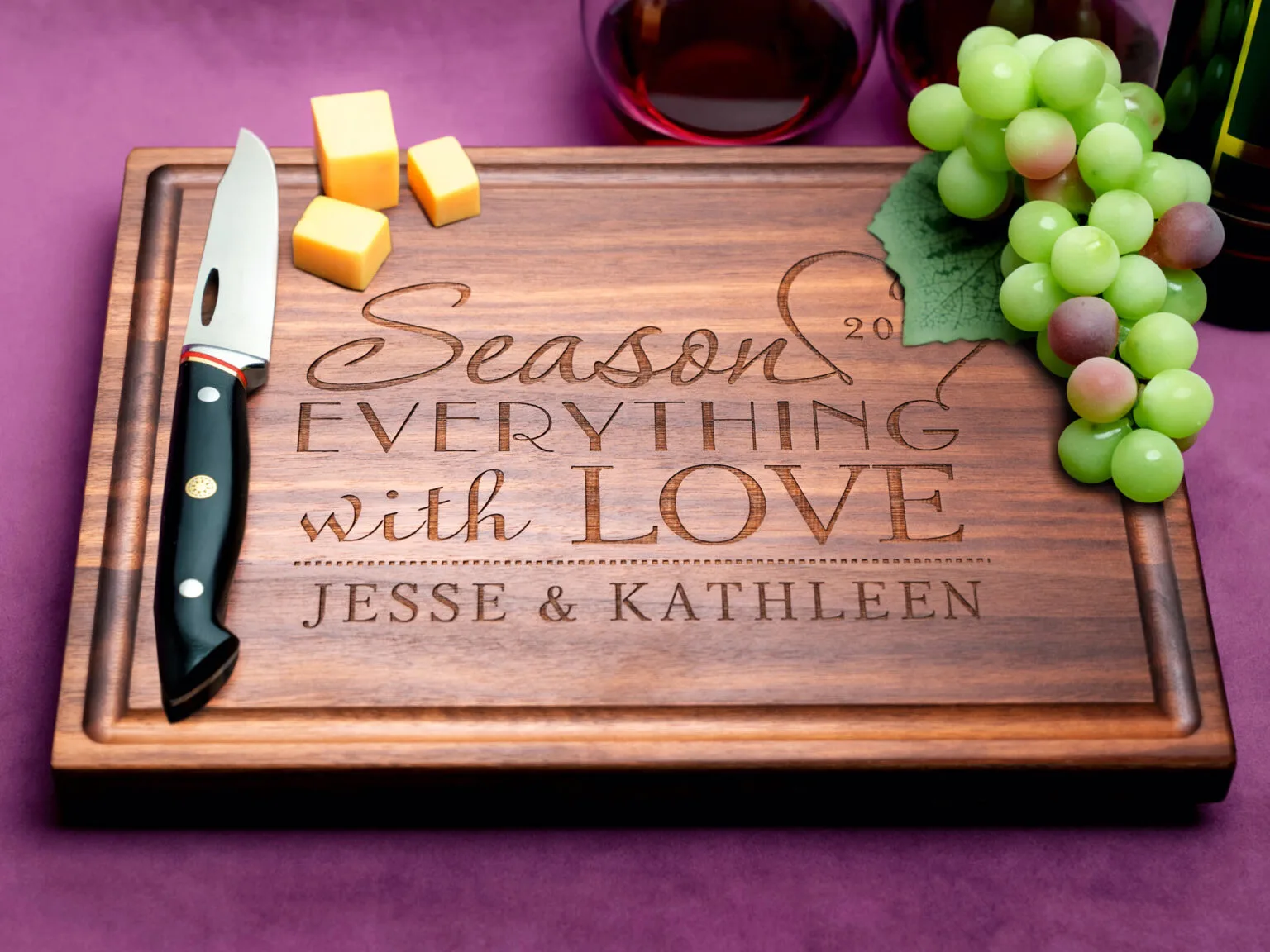 Season Everything with Love design engraved on walnut cutting board