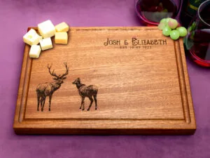 Buck and Doe design engraved on a mahogany charcuterie board unique gift for wild and nature lovers