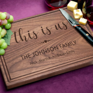 This is us design with family last name and members engraved on a walnut cutting board great gift for family reunion party