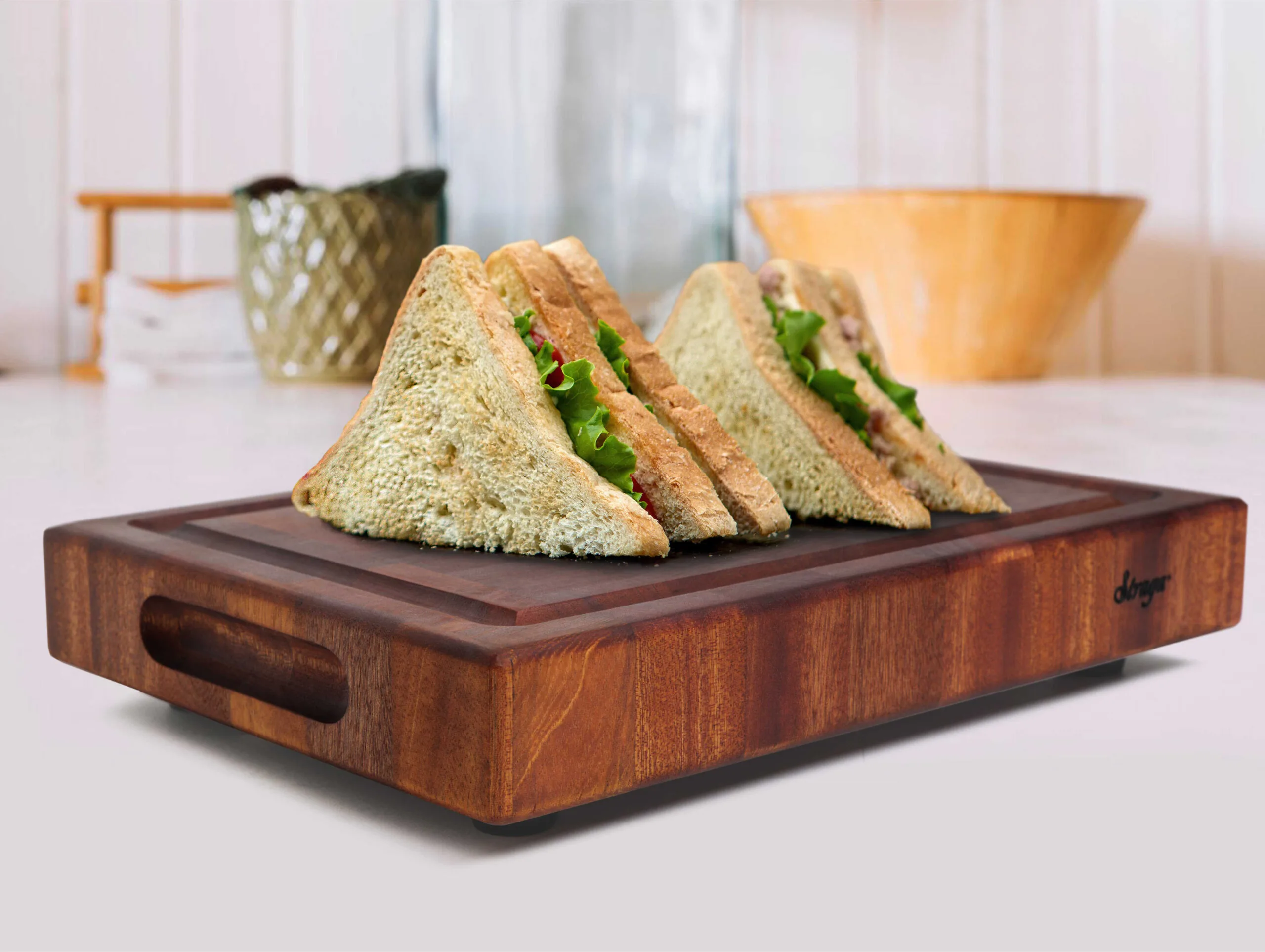 sandwich on end grain chopping block made from natural wood